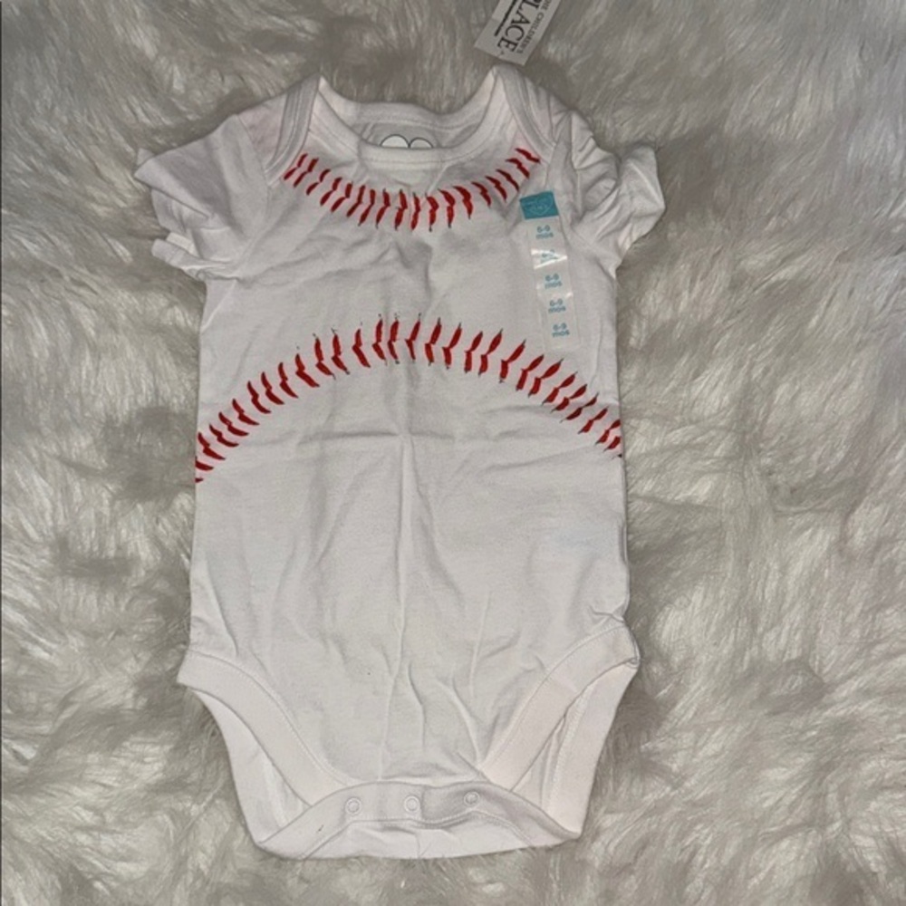 Place White Onesie with Red Stitching